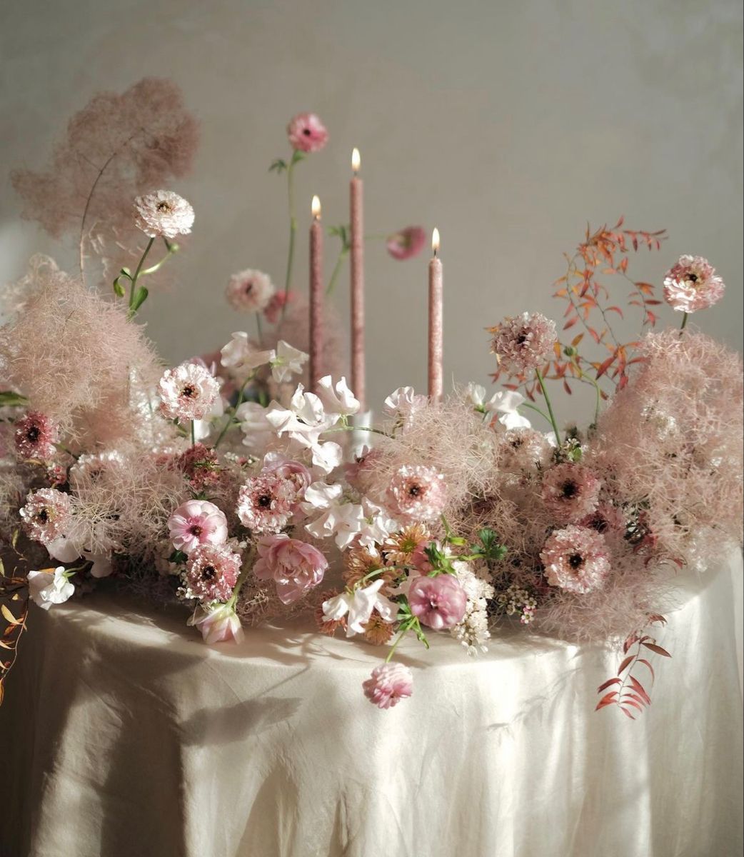 Overhead view of a minimal candlelit tablescape